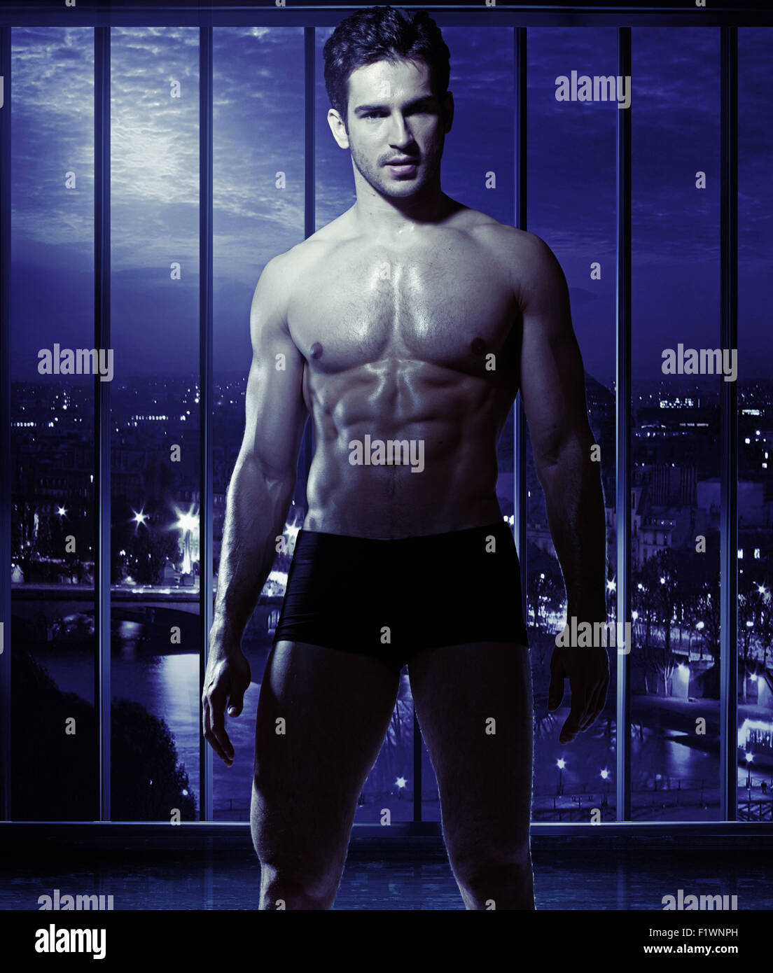 Young man with the muscular body Stock Photo
