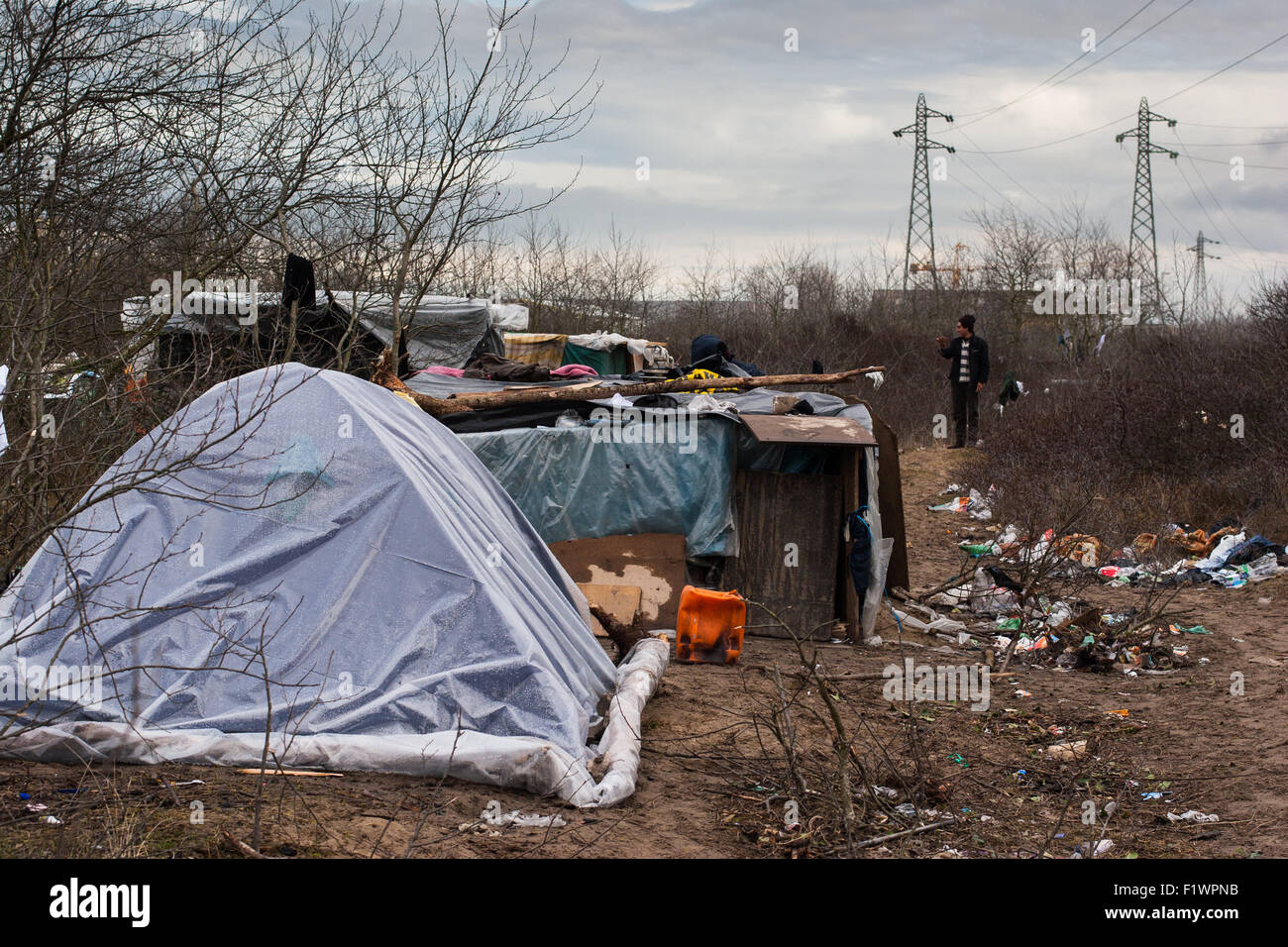 Illegal immigrants from Afghanistan, Syria living in tents in the area known as 'the jungle' in Calais , France Stock Photo