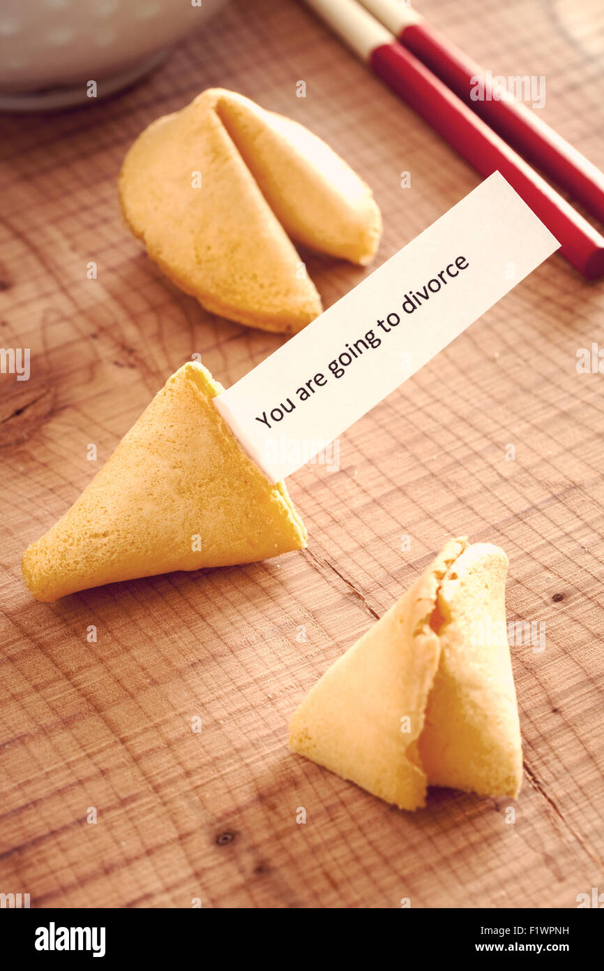 Fortune Cookie with a bad luck divorce message vintage filter applied to image Stock Photo