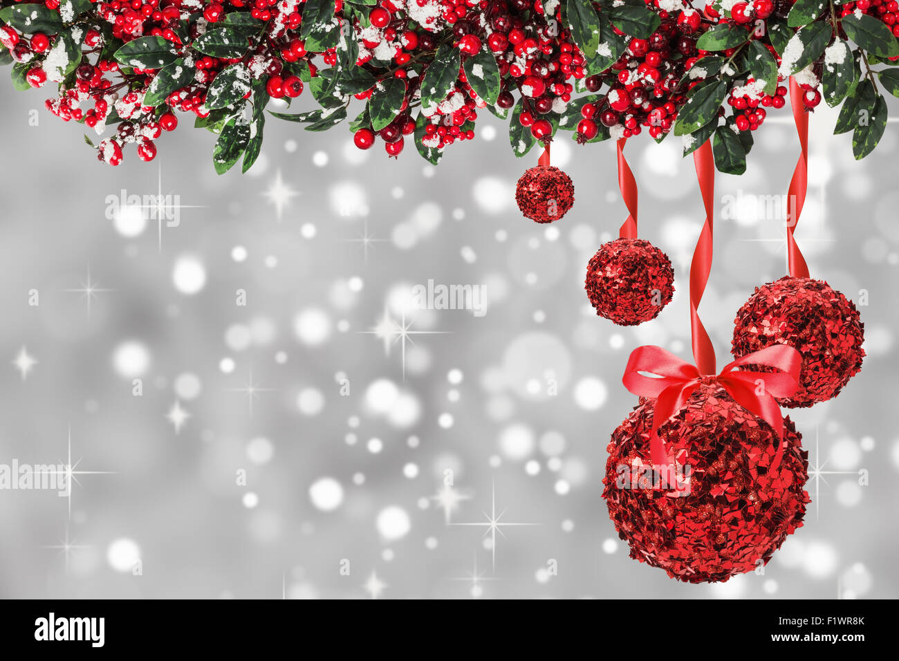 red Christmas balls with Christmas tree on the grey. Stock Photo