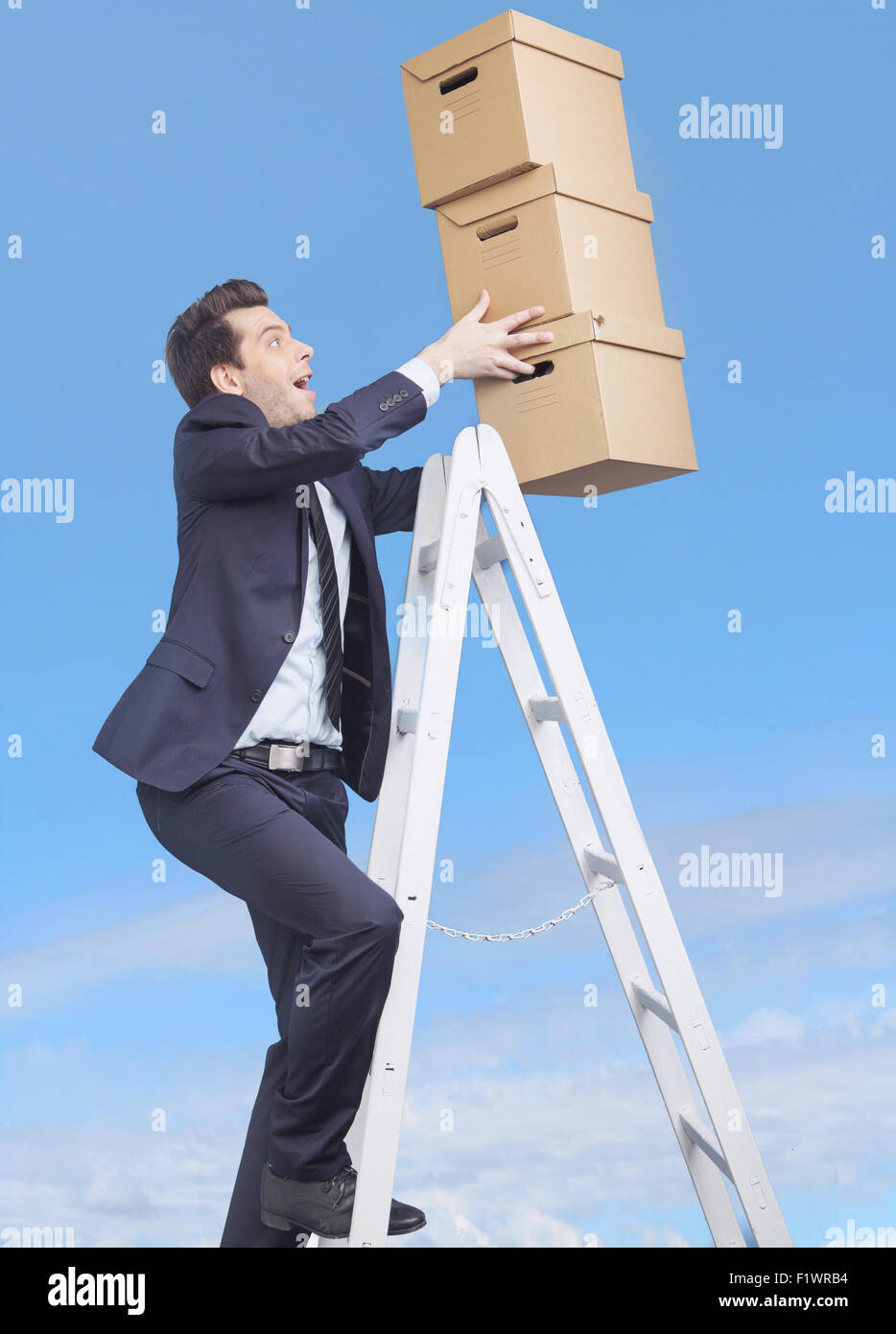 Young banker loosing the boxes Stock Photo