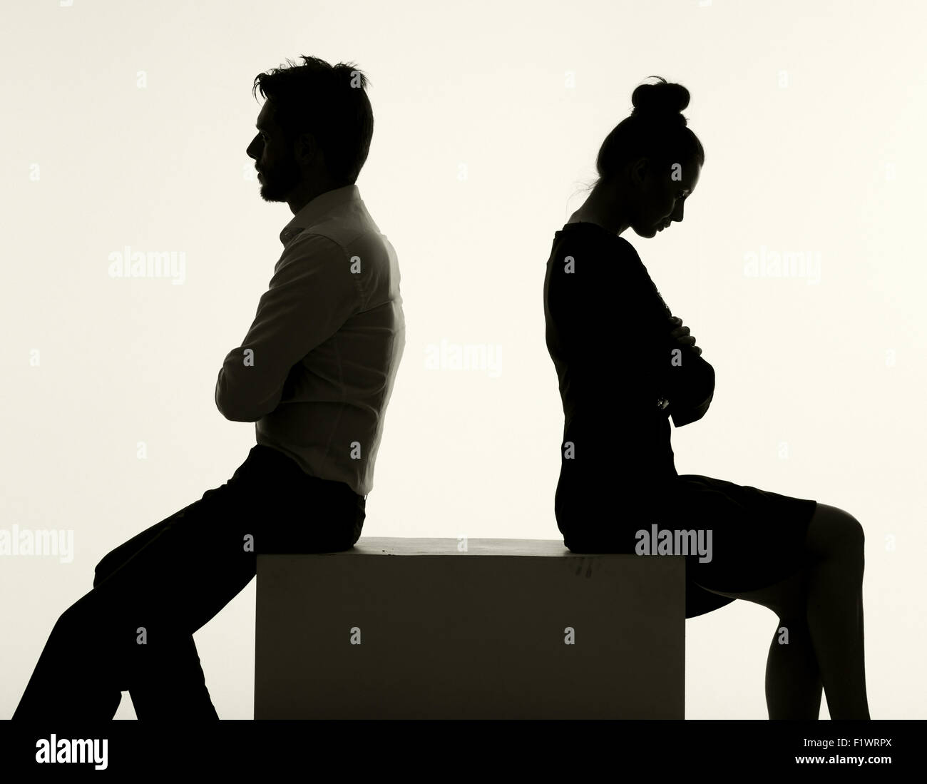 Sad couple having the serious argument Stock Photo - Alamy