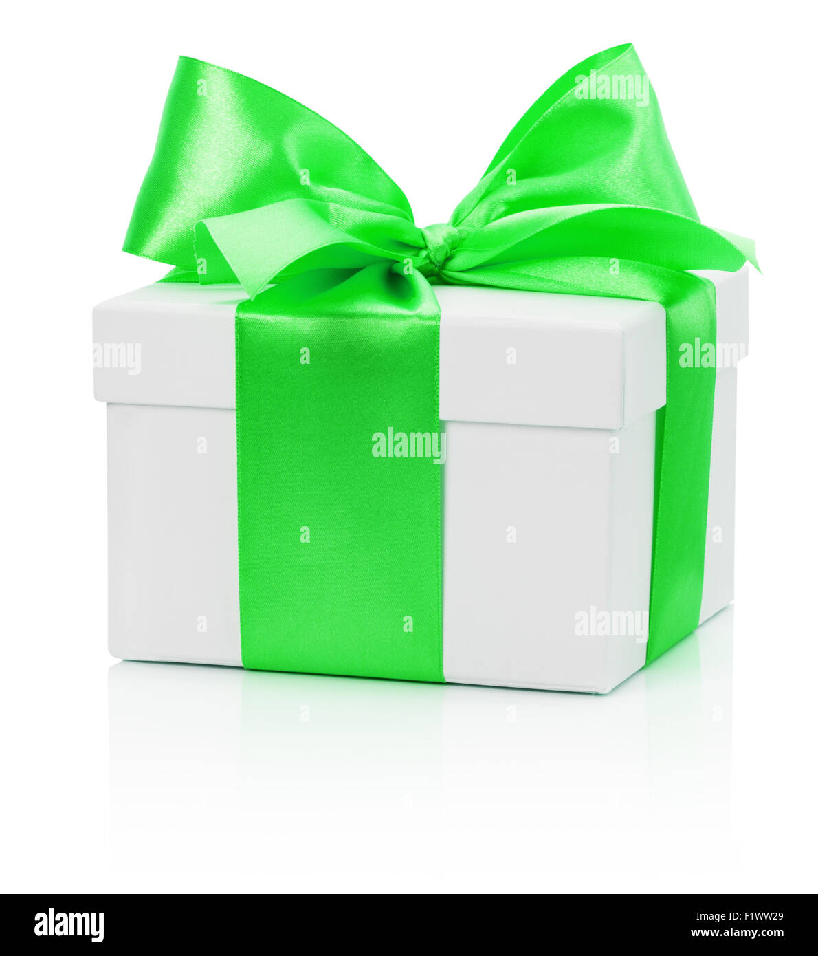 white gift box with green bow isolated on the white background. Stock Photo