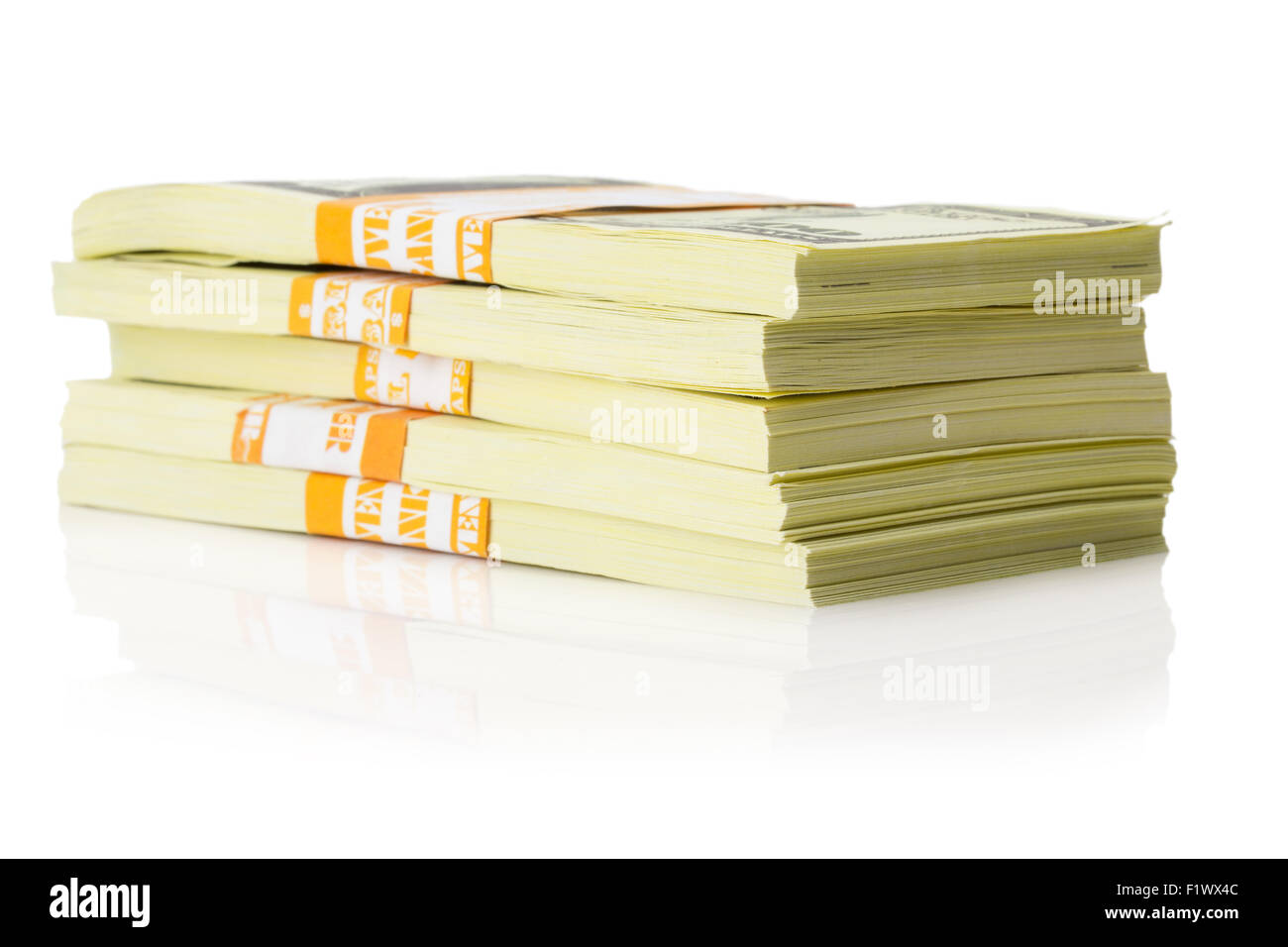 stacks of US dollars bundle isolated on the white background. Stock Photo