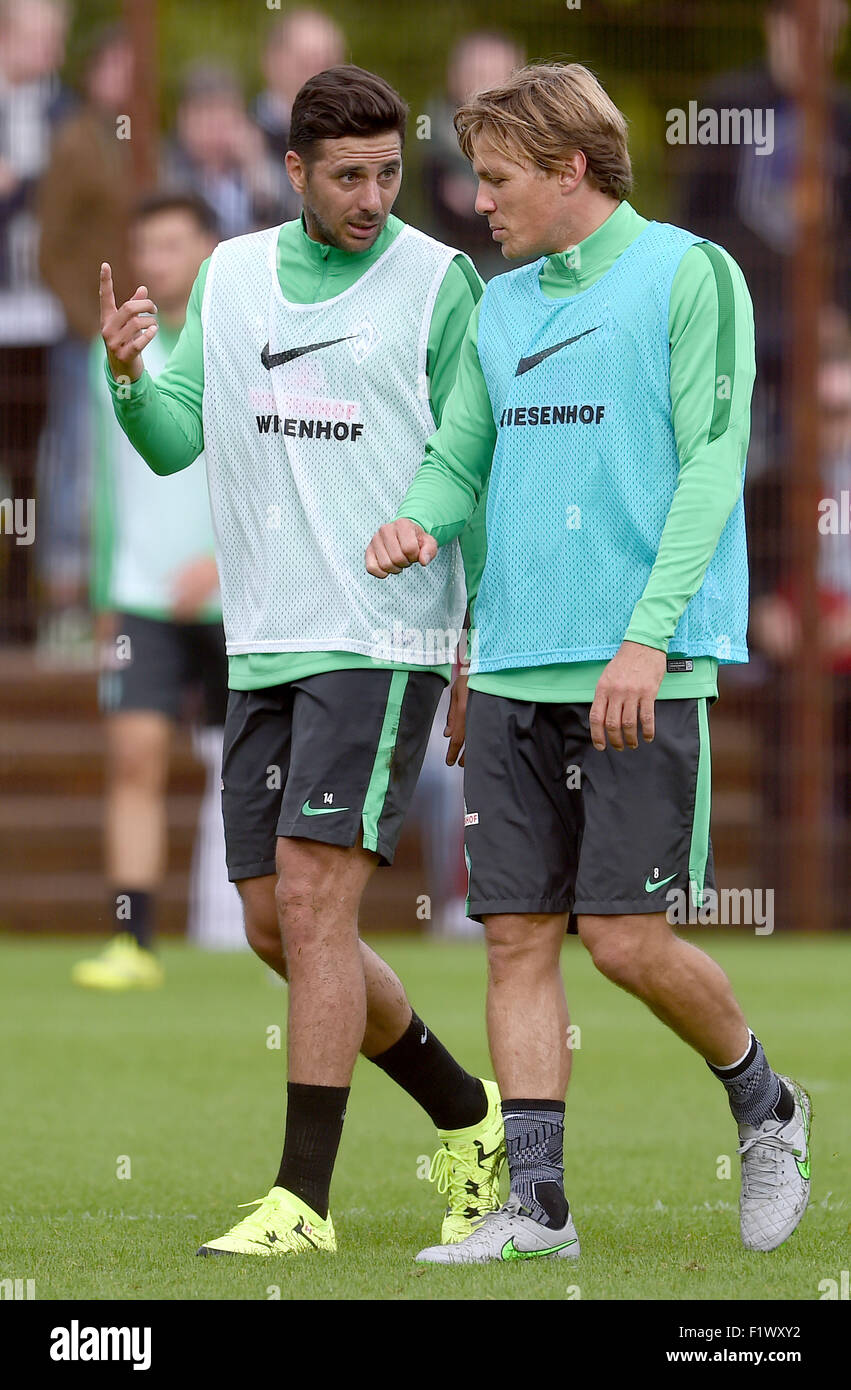 Bremen, Germany. 08th Sep, 2015. Claudio Pizarro (L) speaks to Clemens  Fritz during his first training session with German Bundesliga soccer club  Werder Bremen at the Weserstadion stadium in Bremen, Germany, 08