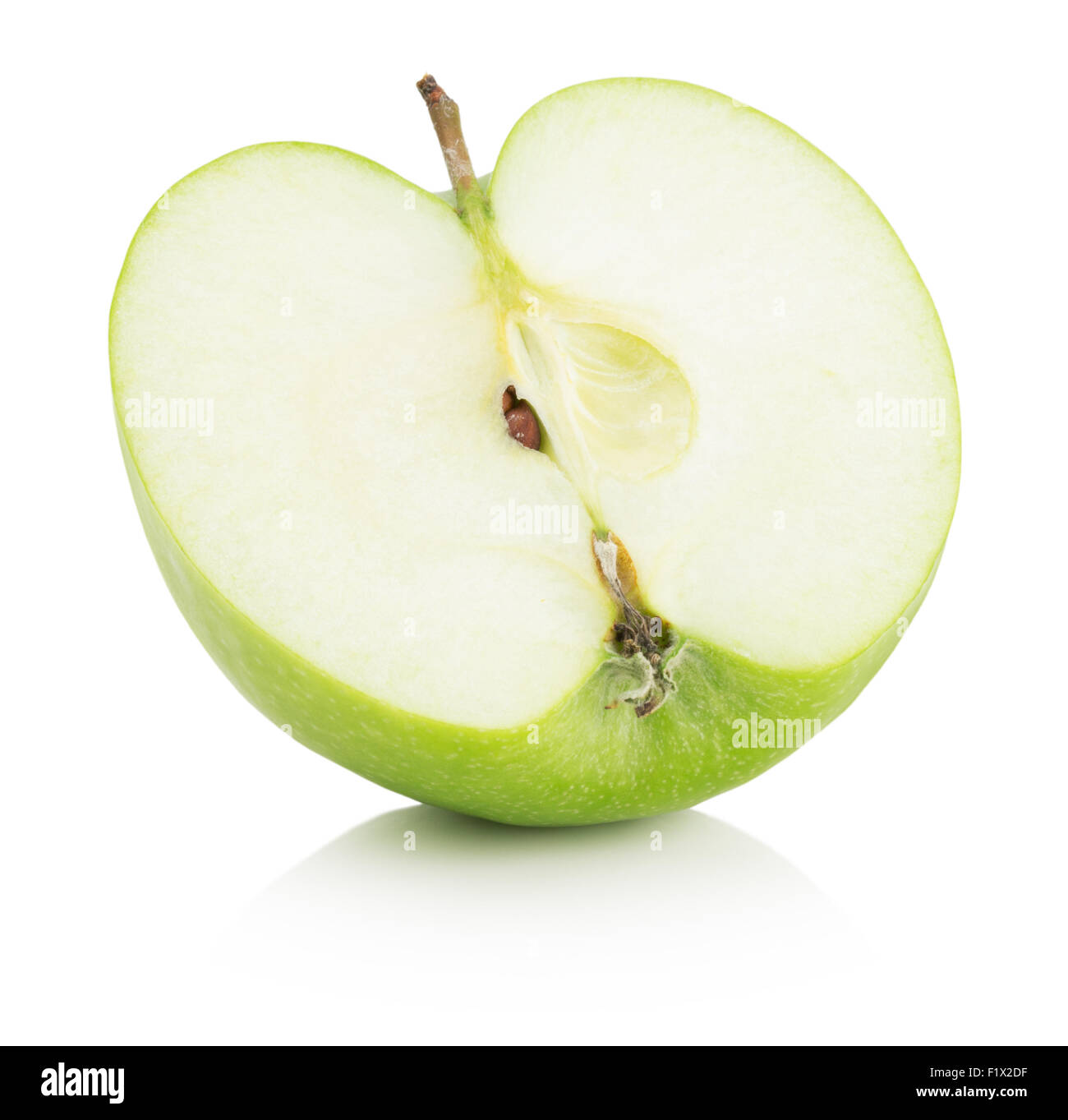 half of green apple isolated on a white background. Stock Photo