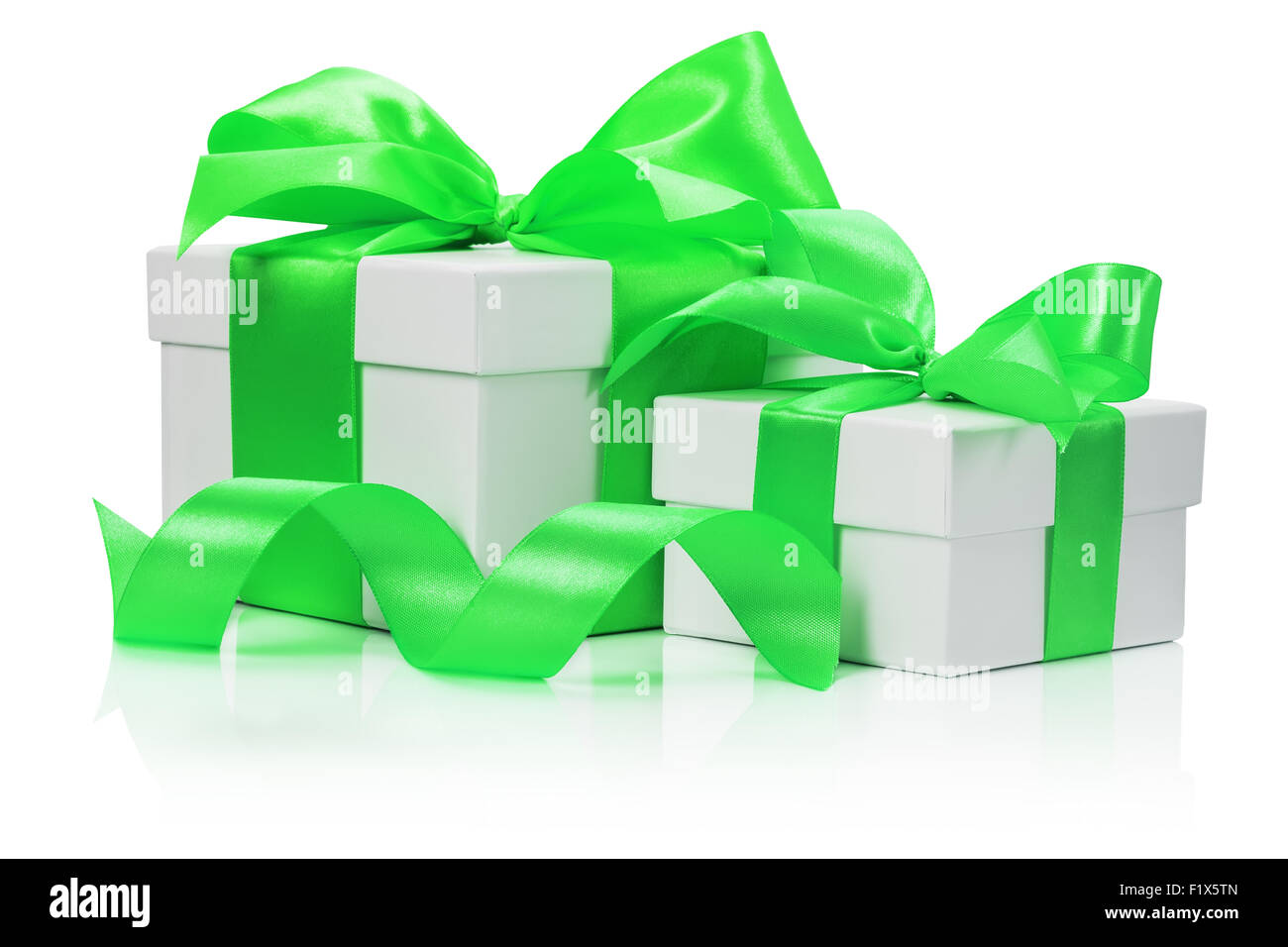gift boxes with green bow isolated on the white background Stock Photo ...
