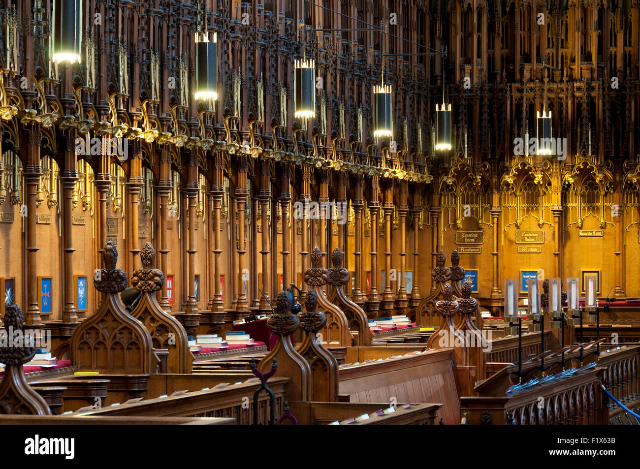 Wooden choir stalls in the choir of York Minster, City of York, Yorkshire, England, UK Stock Photo