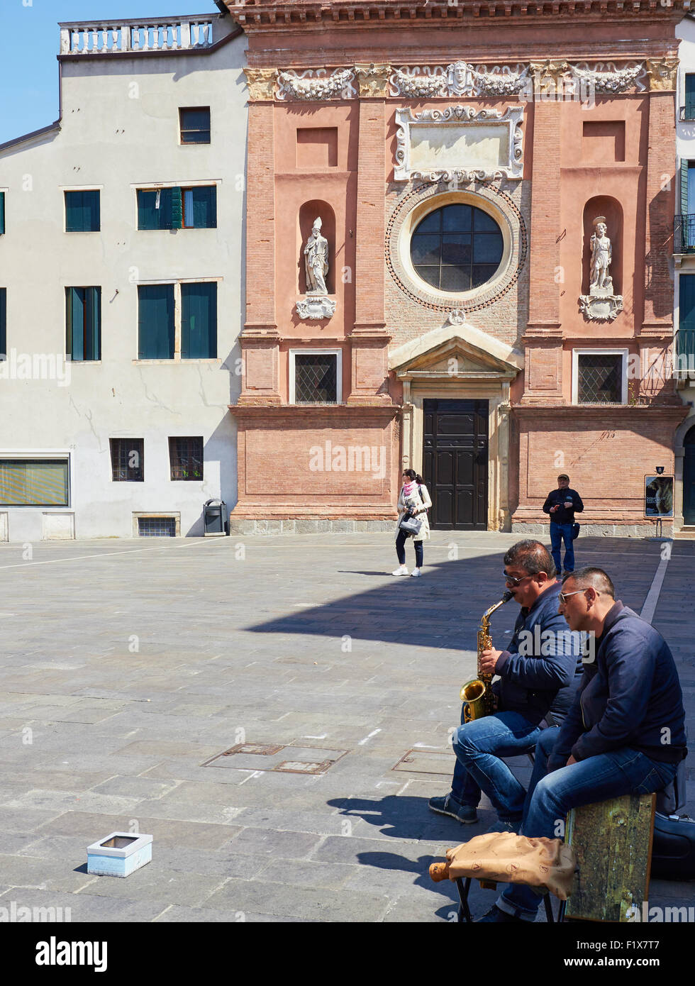 Saxophone player busking in Piazza Dei Signori Padova Veneto Italy Europe Stock Photo