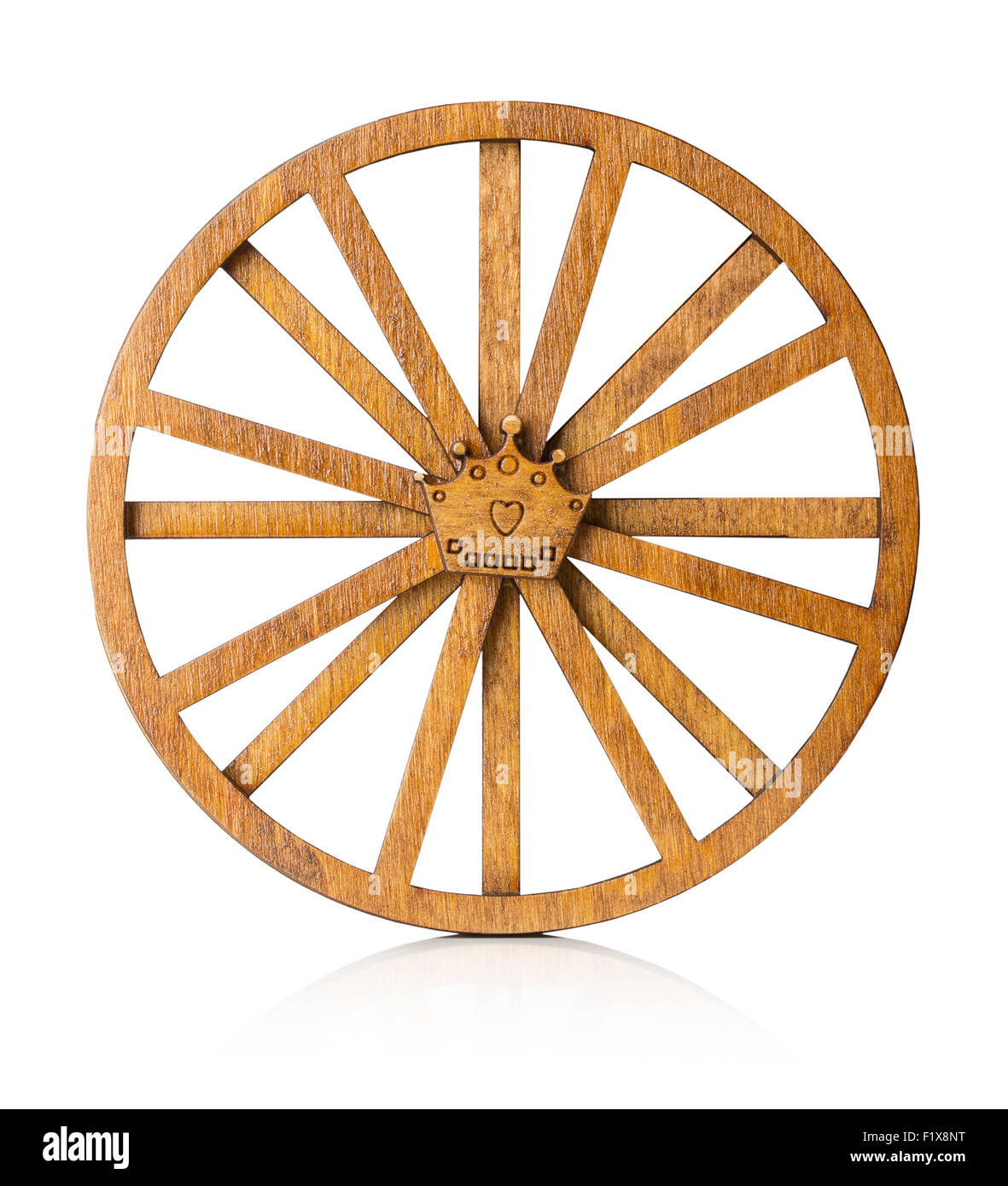 wooden wheel isolated on the white background. Stock Photo