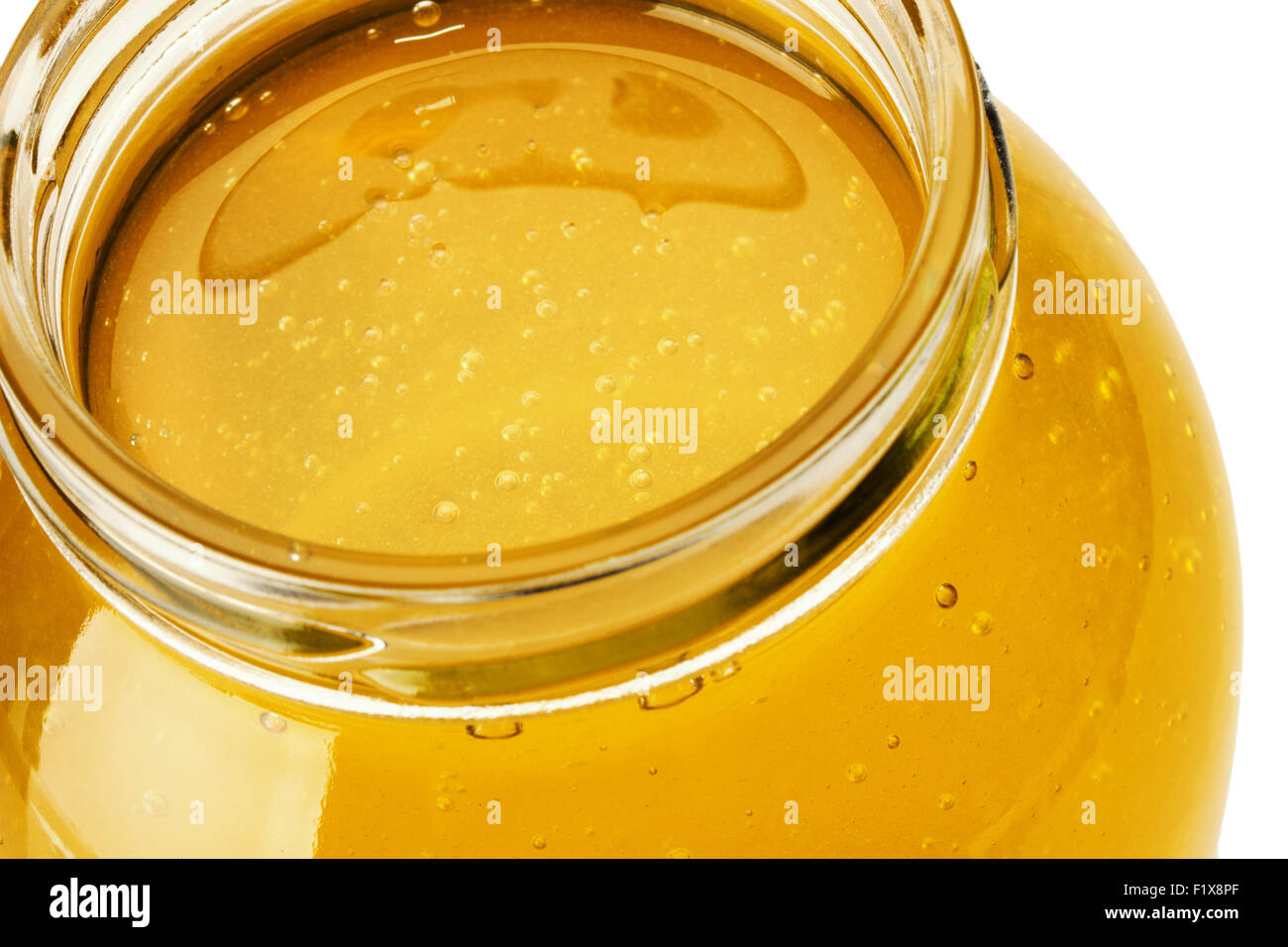 jar with golden honey isolated on the white background Stock Photo Alamy