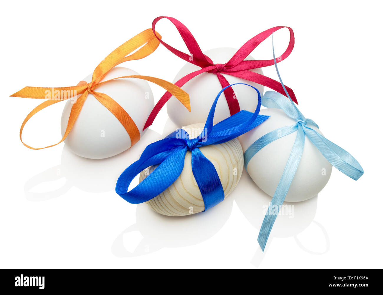 Easter eggs with bows isolated on white background. Stock Photo
