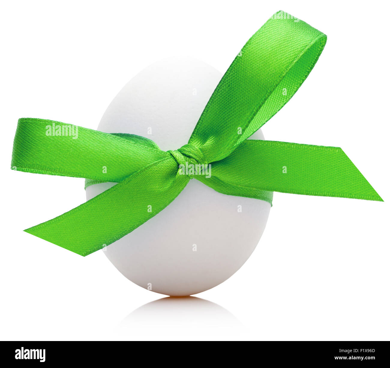 Easter egg with festive green bow isolated on white background. Stock Photo