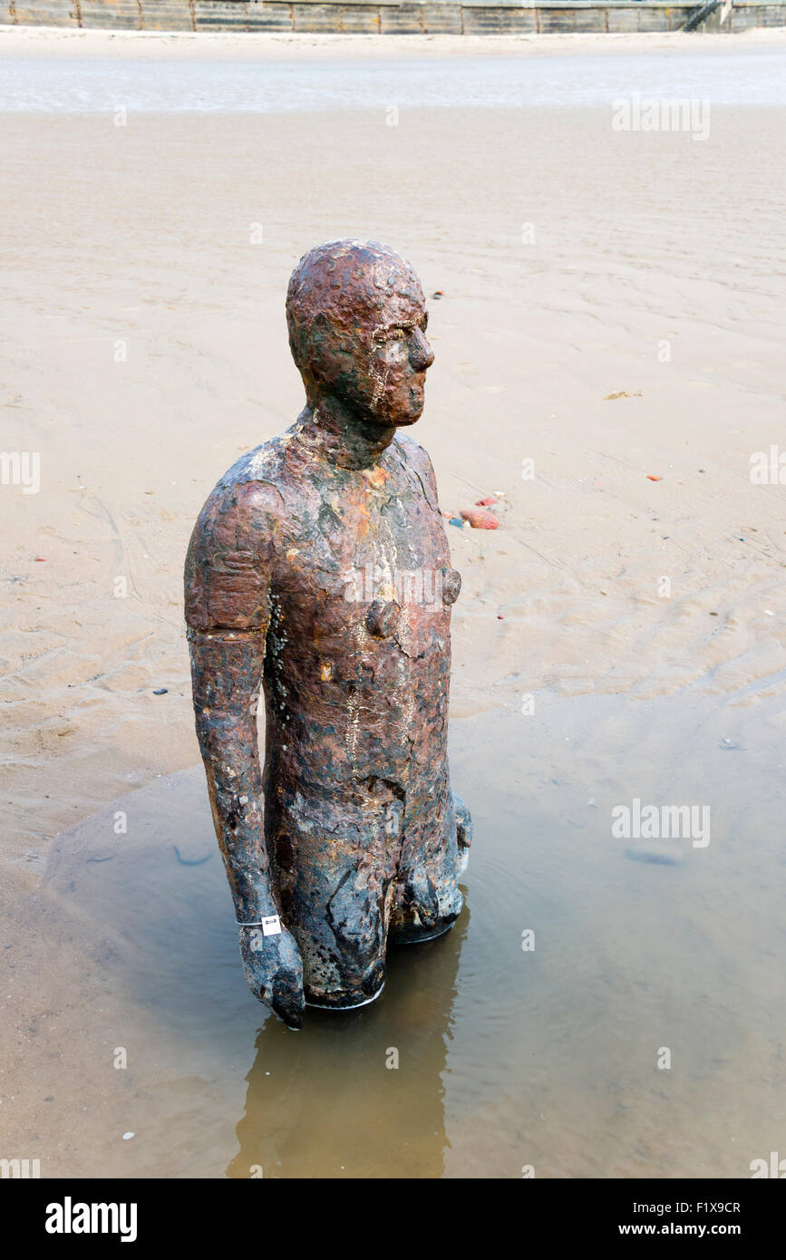 Another Place - a sculpture by Anthony Gormley, Crosby beach, Merseyside, England, UK. Stock Photo