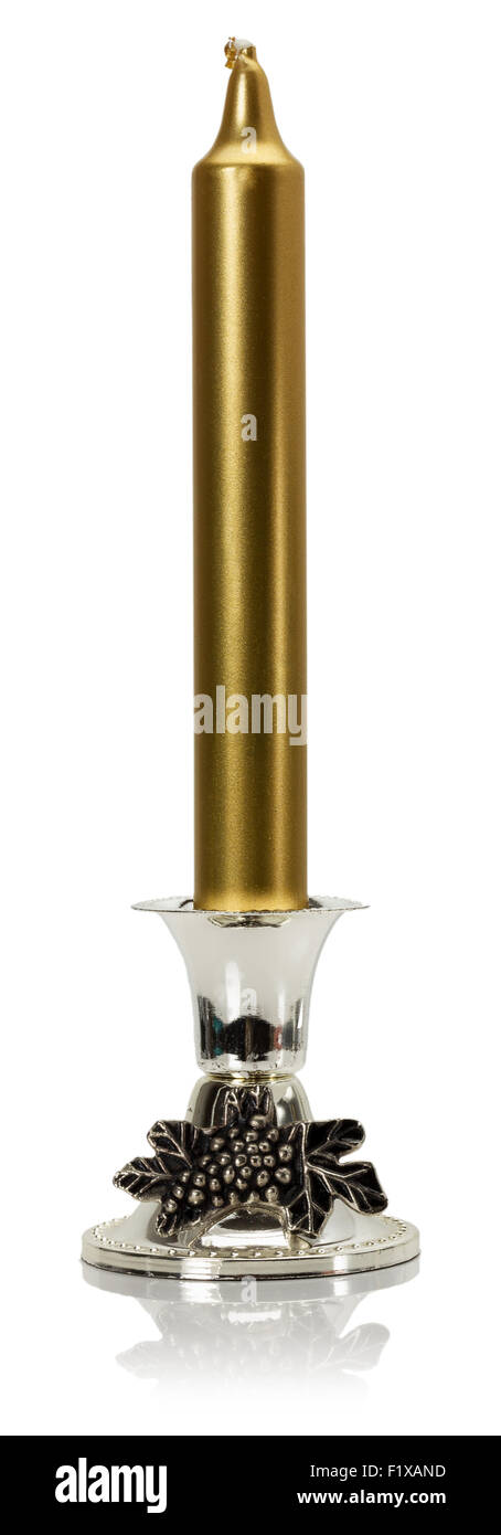 golden candle isolated on the white background. Stock Photo