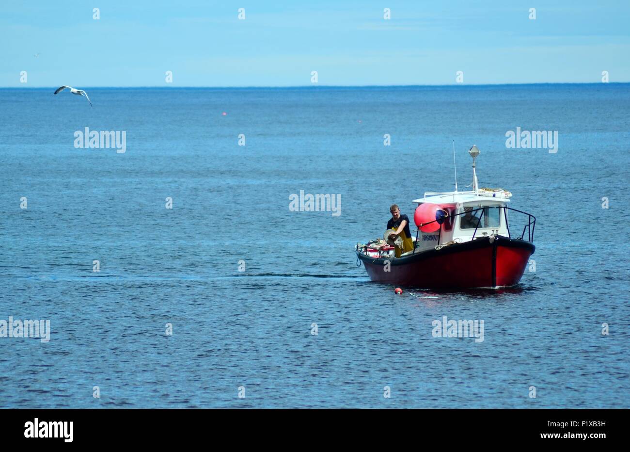 Fishing boat at sea Stock Photo