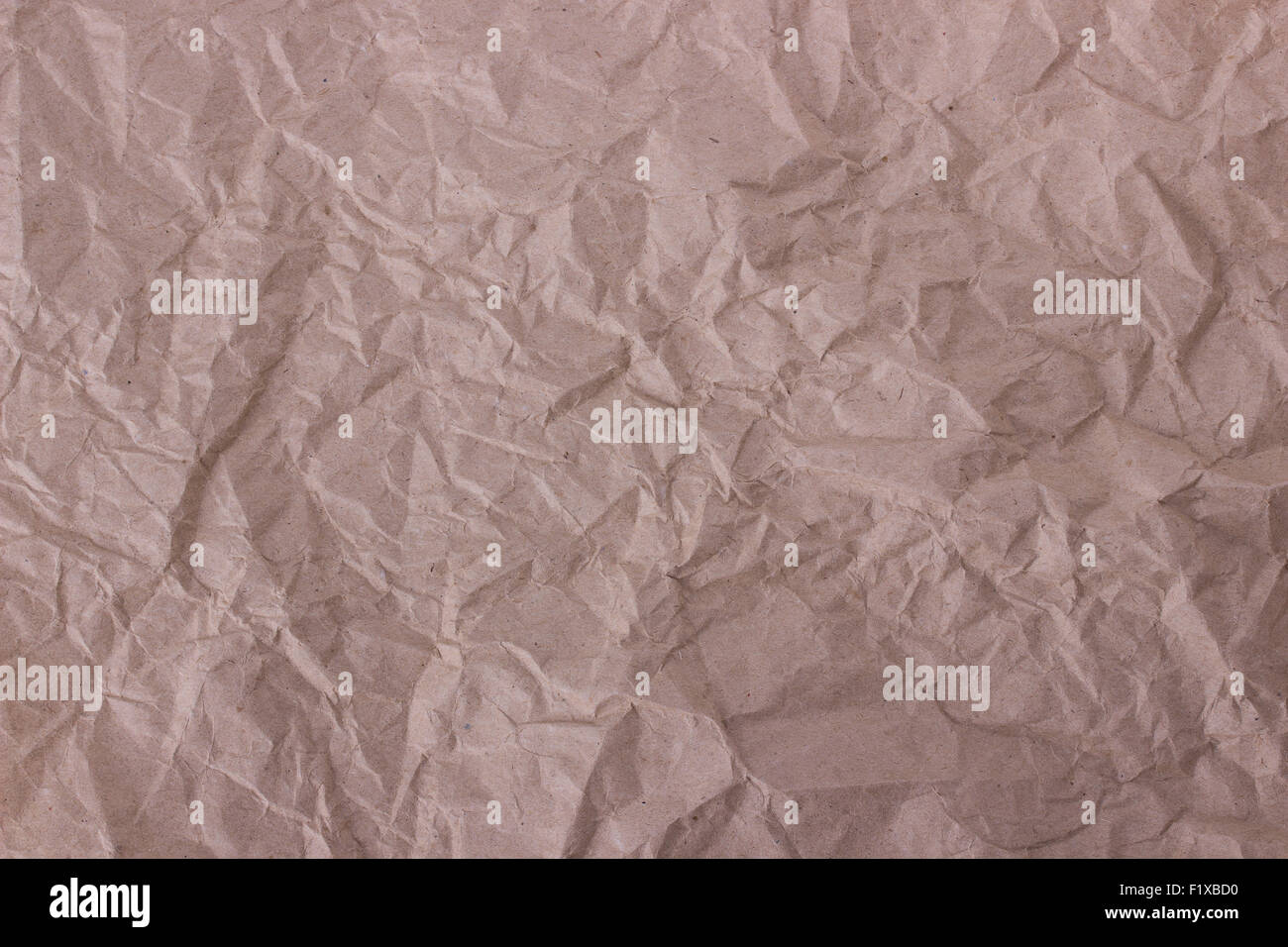 old yellow crumpled paper. Stock Photo