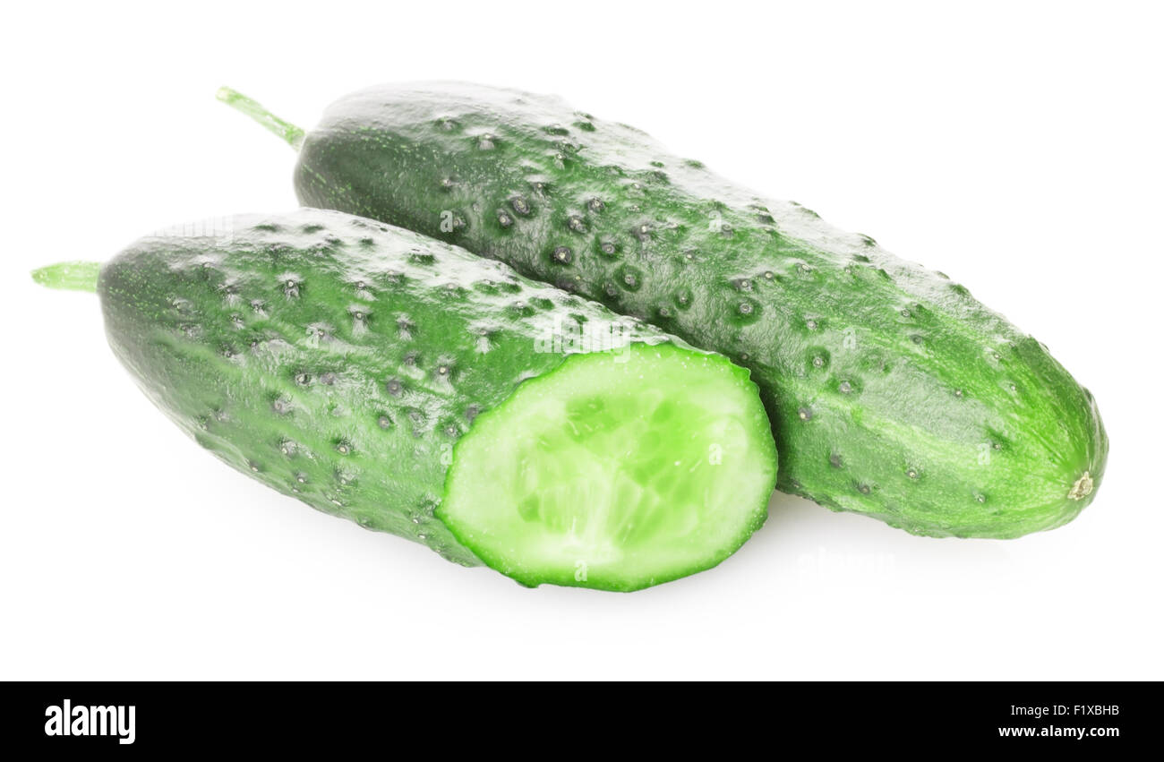 Cucumber and slices isolated over white background. Stock Photo