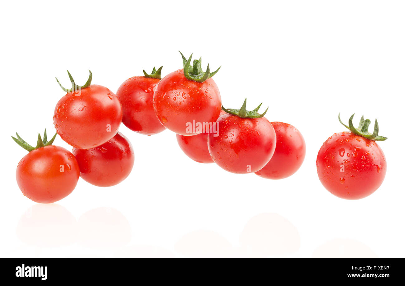 bunch of red tomatoes isolated on a white background Stock Photo - Alamy