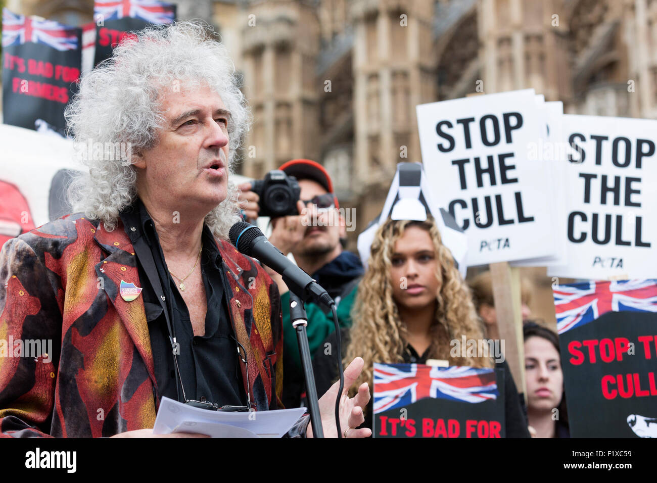 London, UK. 8th September, 2015. Dr Brian May, astrophysicist and guitarist of Queen, joins the Stop the Badger Cull protest at the Houses of Parliament. The protesters, including the animal rights organisation PETA, plan to launch legal action against the culling. Badgers are carriers of Bovine TB (Mycobacterium bovis) and thought to be responsible for spreading the disease. Photo: Vibrant Pictures/Alamy LIve News Stock Photo