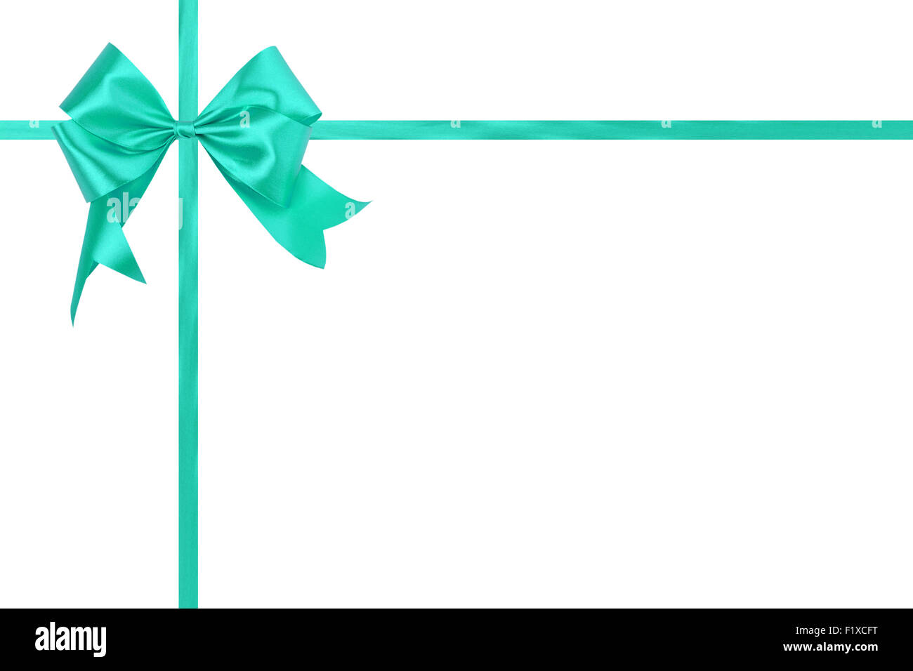 light green bow with a ribbon on a white background. Stock Photo
