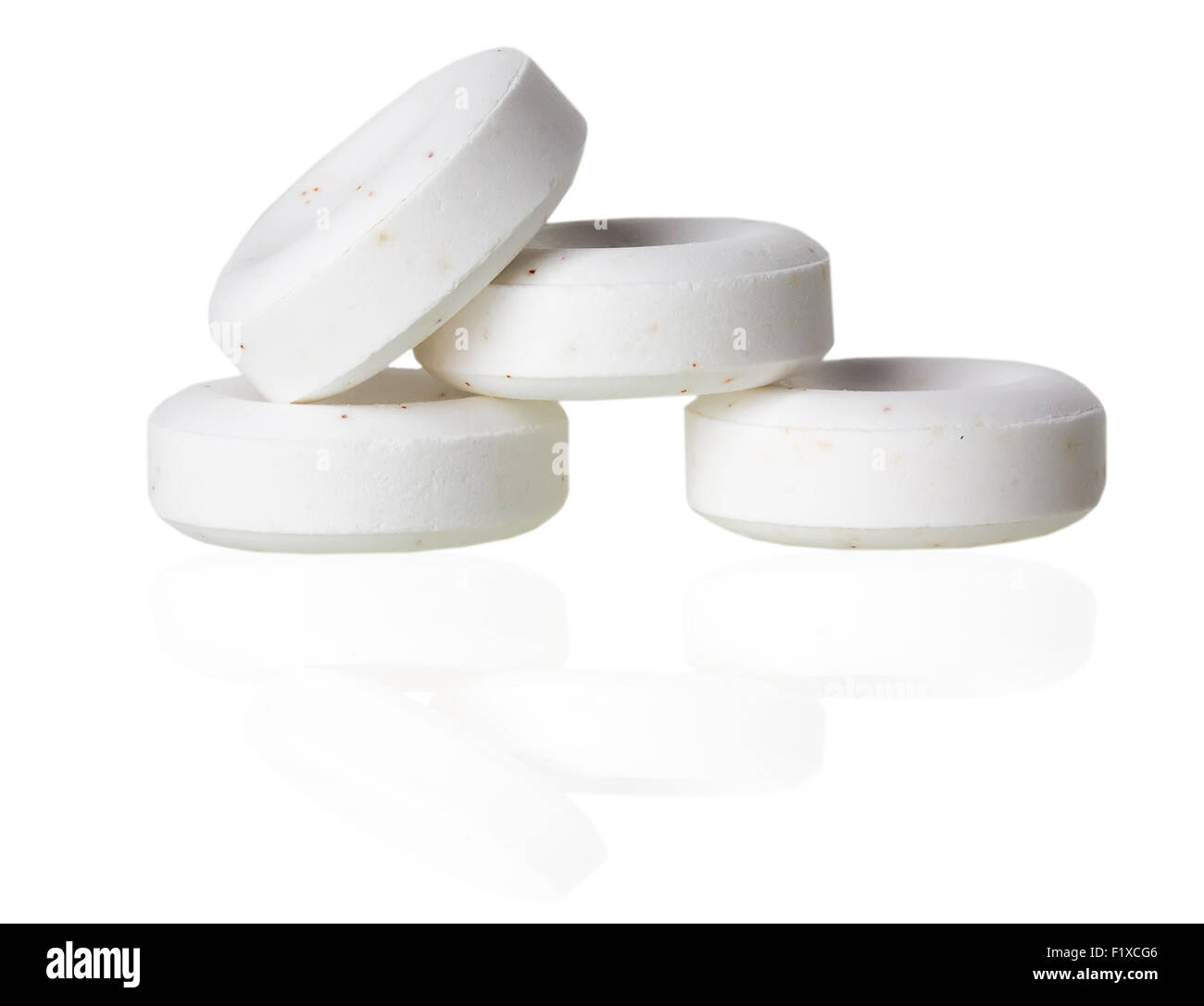 white pills on white background. Stock Photo