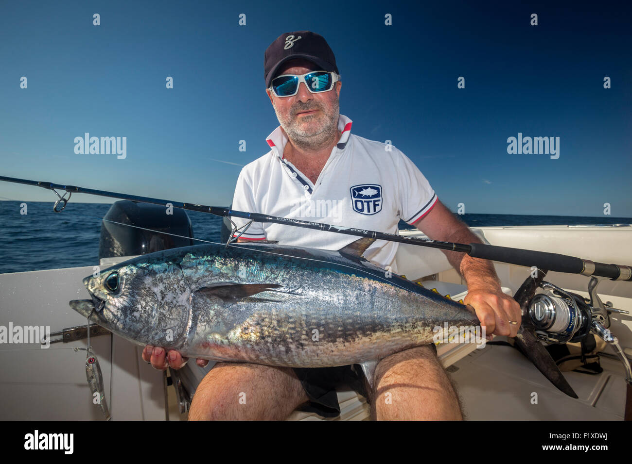 Atlantic bluefin tuna (Thunnus thynnus) sport fishing in the Basque country (France). Fisherman presenting trophy. Stock Photo