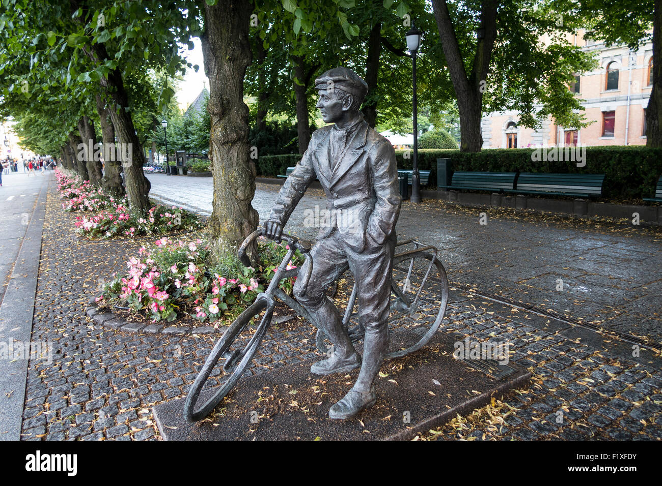 Statue of a man and his bycicle on the streets of Oslo, Norway Stock Photo