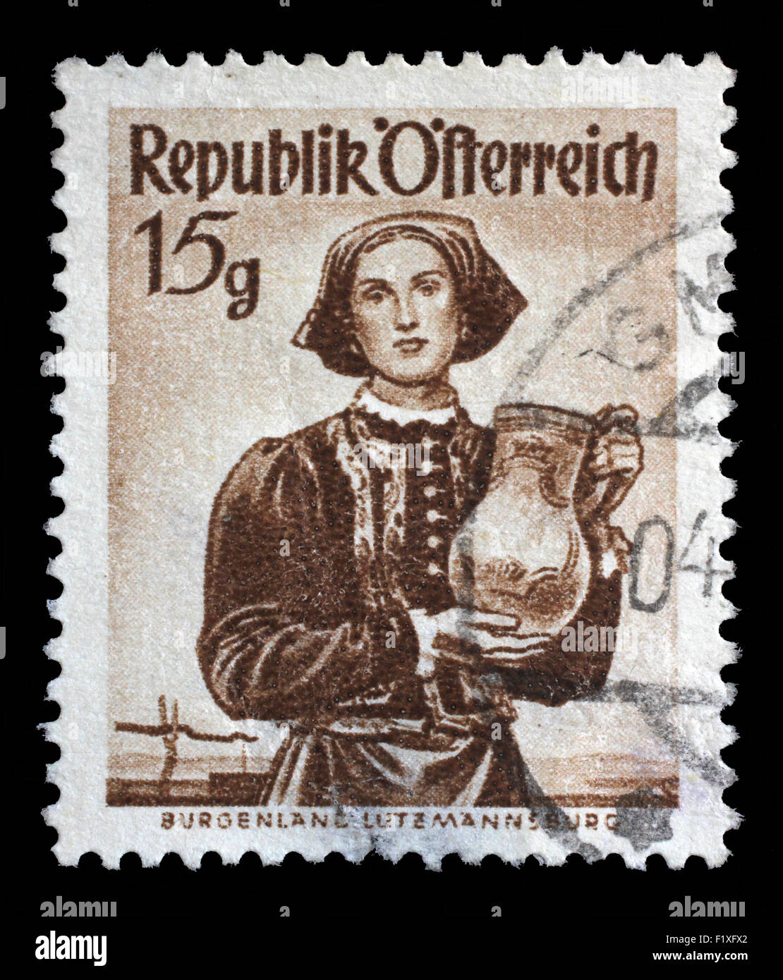 Stamp printed in Austria shows image woman in national Austrian costumes, Burgenland, Lutzmannsburg, series, circa 1948 Stock Photo