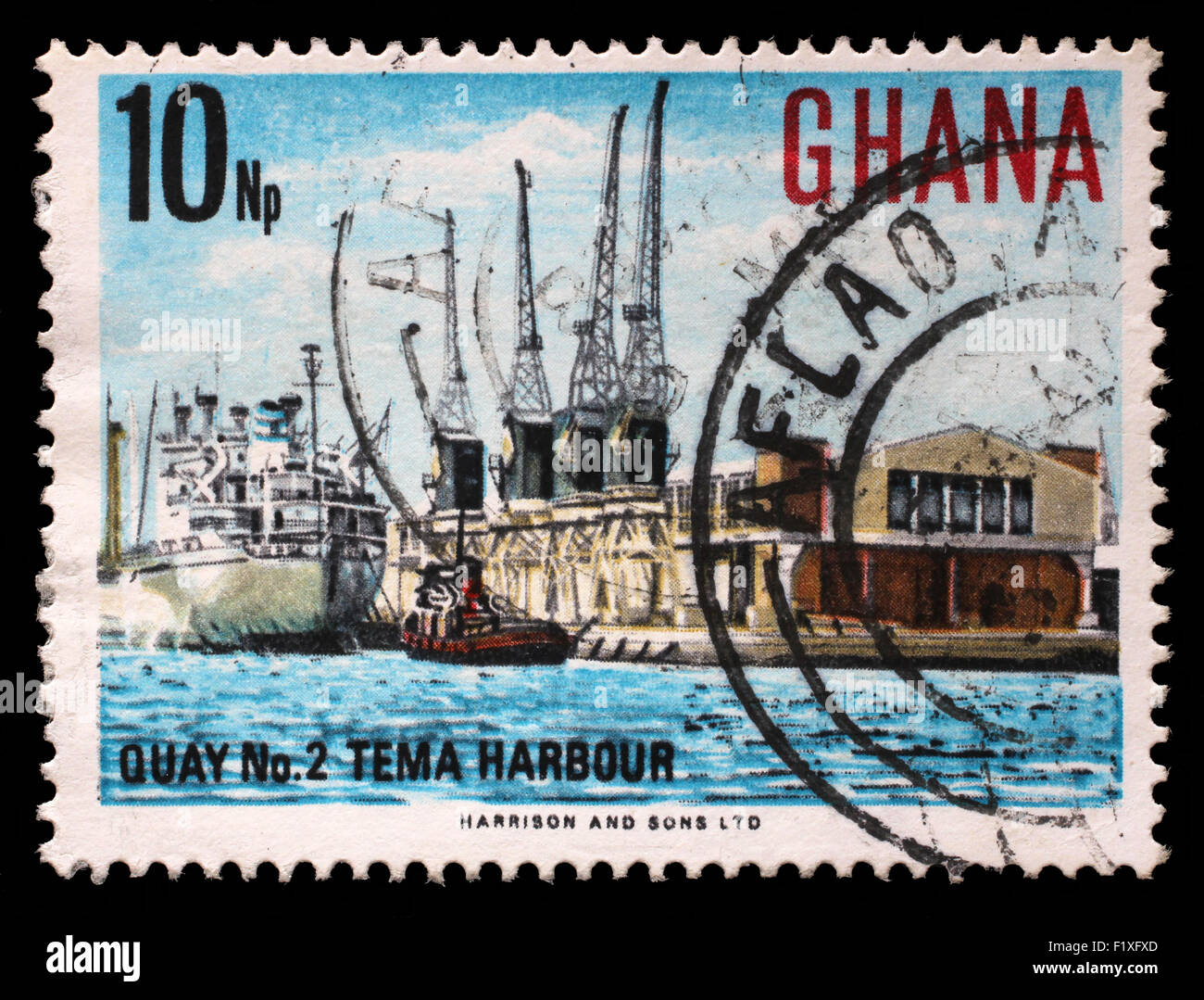 Stamp printed in Ghana shows Tema Harbour, National Symbols, circa 1967. Stock Photo
