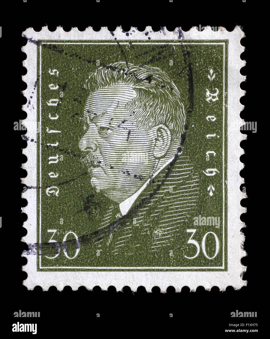 Stamp printed in the German Reich shows Friedrich Ebert (1871-1925), 1st President of the German Reich, circa 1928. Stock Photo