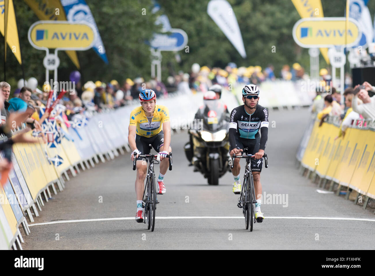 Floors Castle, Kelso, UK. 08th Sep, 2015. Race leader and yellow jersey wearer Petr Vakoc (Etixx-Quickstep) crosses the finishing line several minutes down on the leaders after being caught in a crash with 3.5km to go on stage three of the Aviva Tour of Britain between Cockermouth and Kelso, United Kingdom on 8 September 2015. The race, which covers 7 stages, started on 6 September in Beaumaris, Anglesey, and ends on 13 August in London, United Kingdom. Credit:  Andrew Peat/Alamy Live News Stock Photo