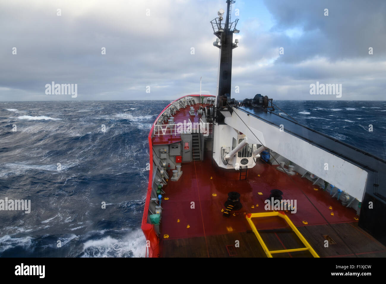 Fishery Patrol vessel MV Pharos S.G. heading into rough weather in the South Atlantic. Stock Photo