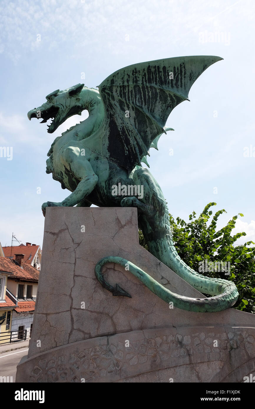 Dragon - symbol of the Slovenian capital on the Dragon Bridge in Ljubljana, Slovenia Stock Photo