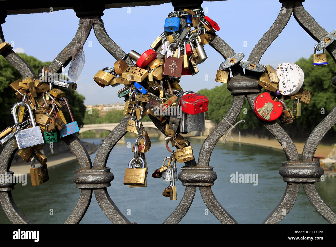 Love lock attached on the Sant'Angelo bridge over the Tiber. Rome, Italy. Stock Photo