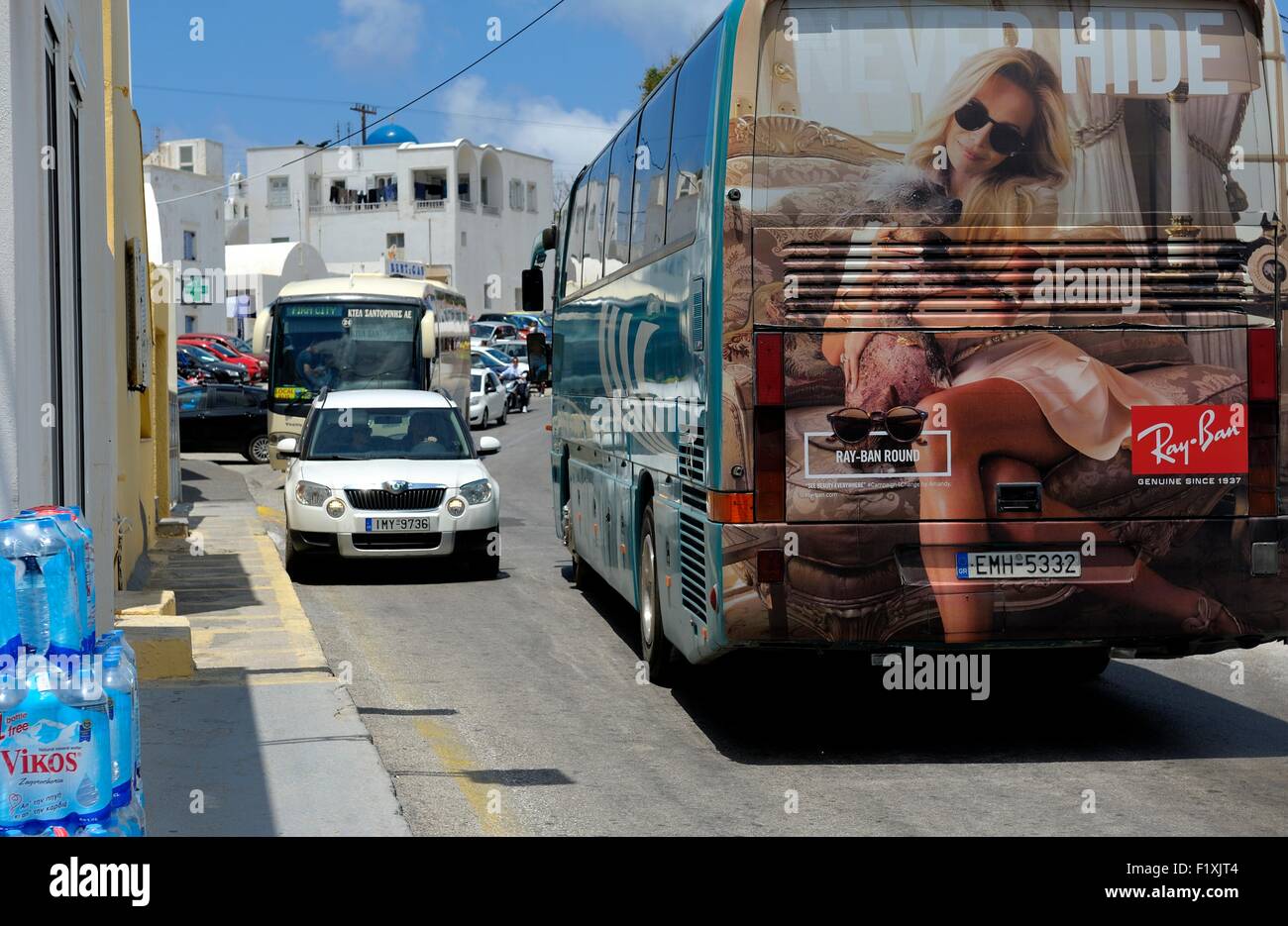 A Ray ban sunglasses advertisement on the back of a tourist coach on the  island of Santorini Greece Stock Photo - Alamy