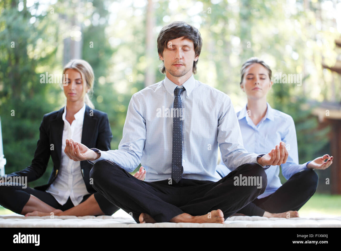 business people doing yoga Stock Photo - Alamy