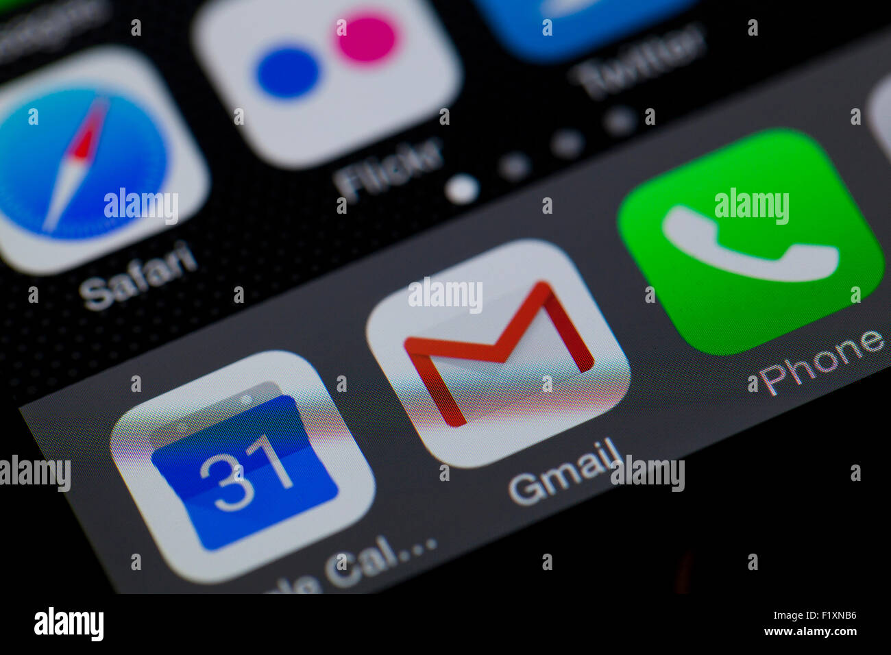 GMail app icon on iPhone screen - USA Stock Photo