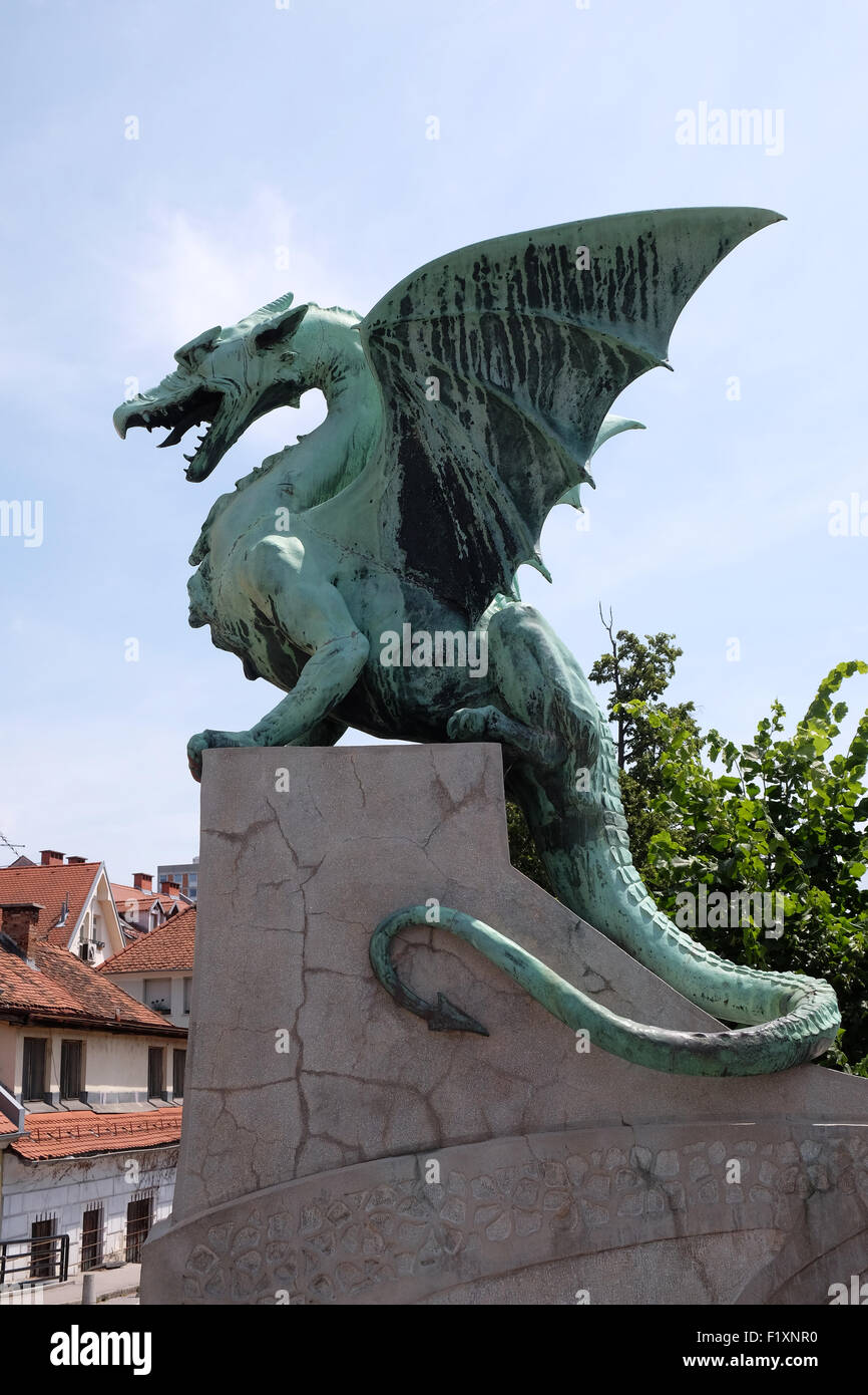 Dragon - symbol of the Slovenian capital on the Dragon Bridge in Ljubljana, Slovenia Stock Photo