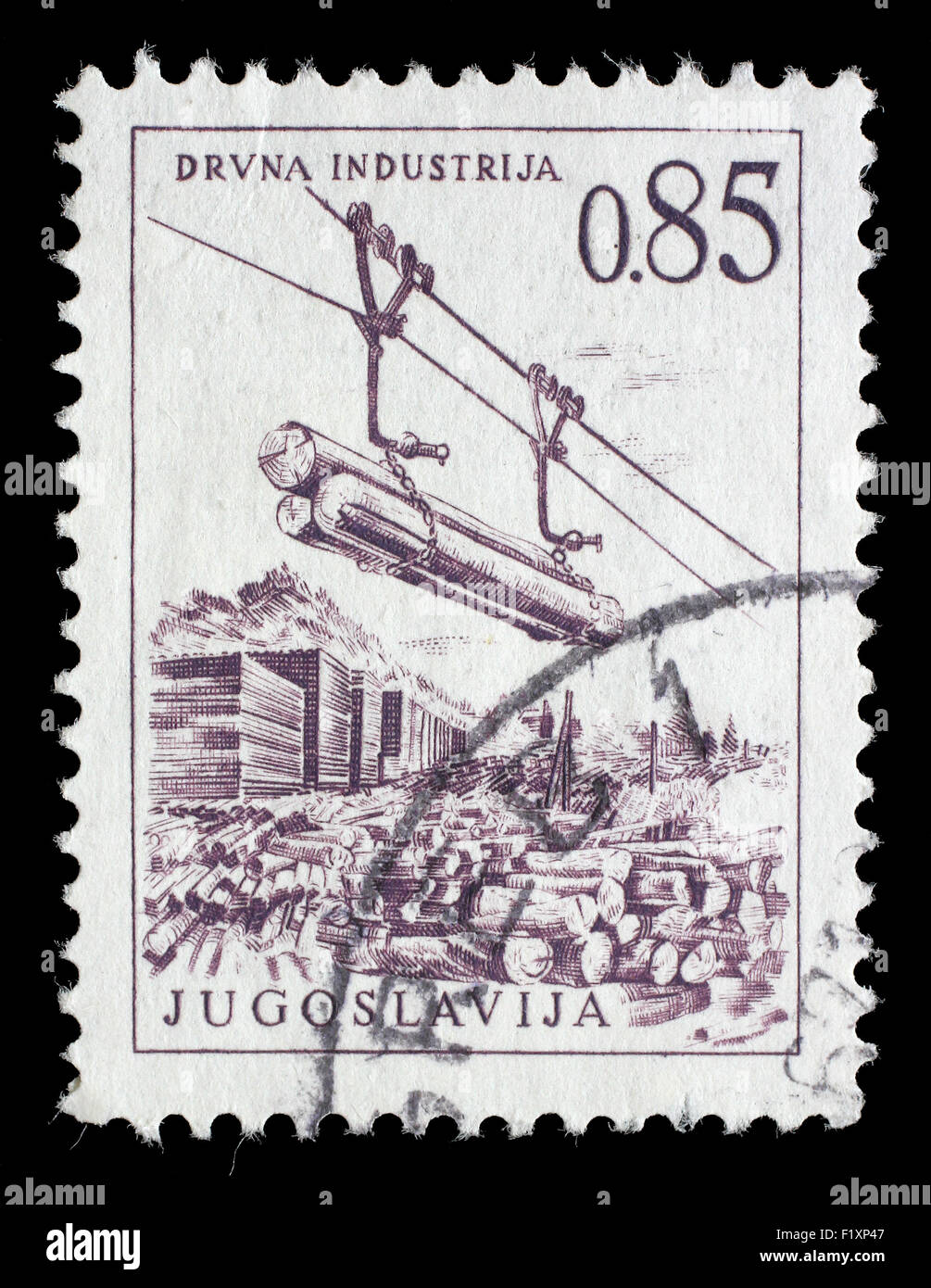 Stamp printed in Yugoslavia shows lumber industry, circa 1966 Stock Photo