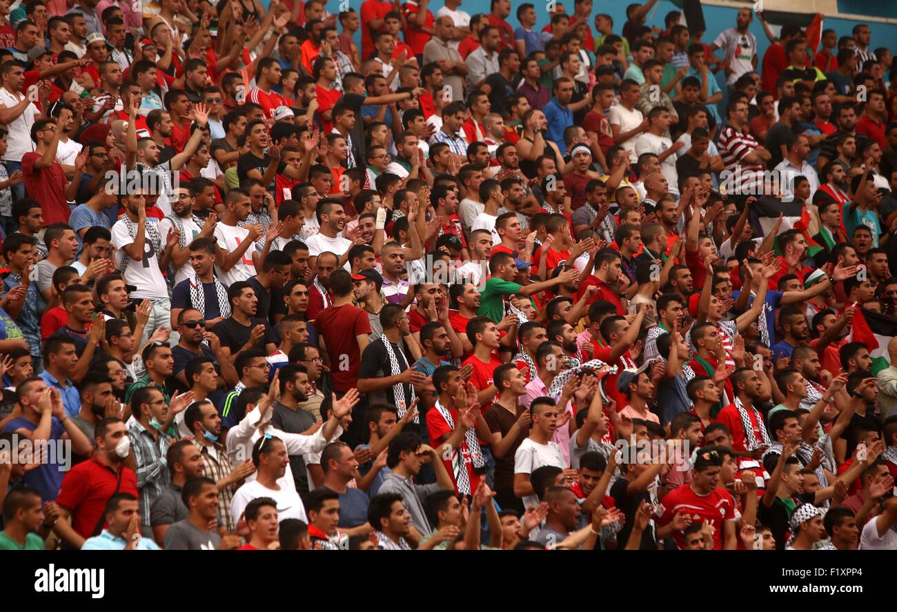 Sept. 8, 2015 - Al-Ram, West Bank, Palestinian Territory - Palestinian fans cheer during the 2018 FIFA World Cup qualifying football match between Palestine and UAE, at the Faisal al-Husseini Stadium, on September 8, 2015 in the West Bank town of Al-Ram © Shadi Hatem/APA Images/ZUMA Wire/Alamy Live News Stock Photo