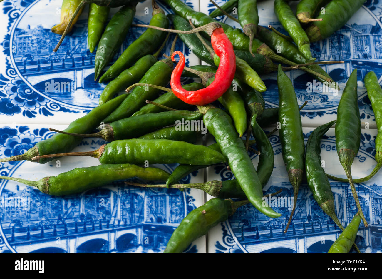 Red and green hot chili peppers Stock Photo - Alamy
