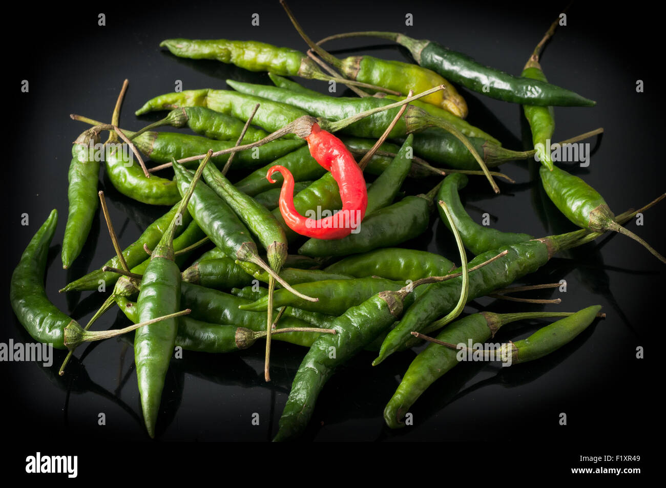 green chili peppers and red Stock Photo Alamy