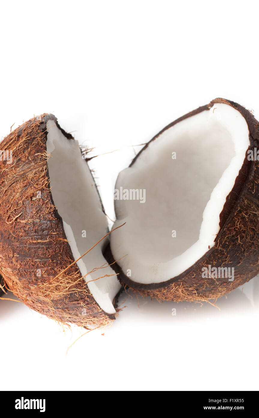 Coconut broken in half Stock Photo Alamy