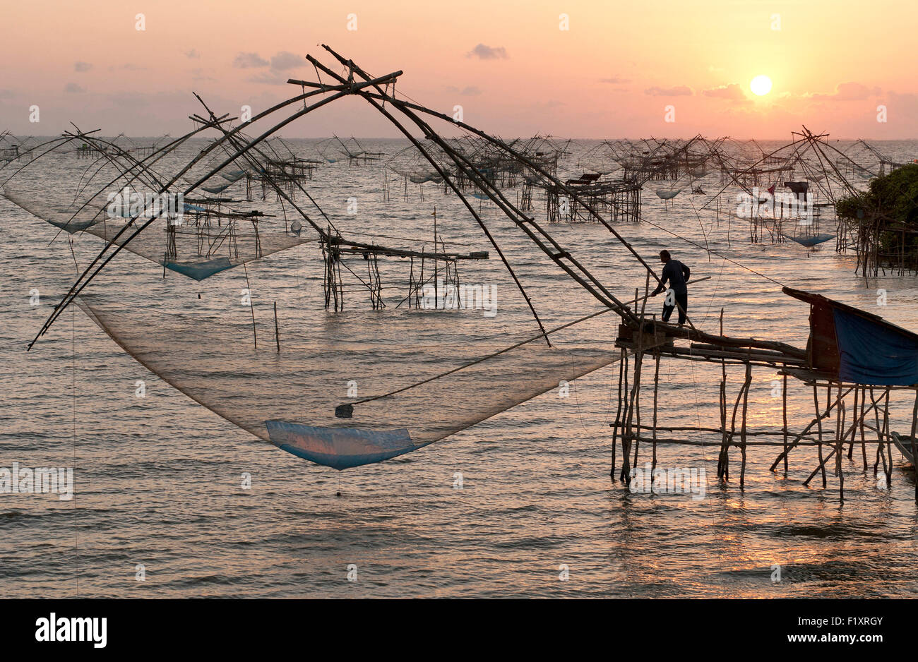 Thailand, Phatthalung, Shore-operated lift net, On sunrise Stock Photo -  Alamy