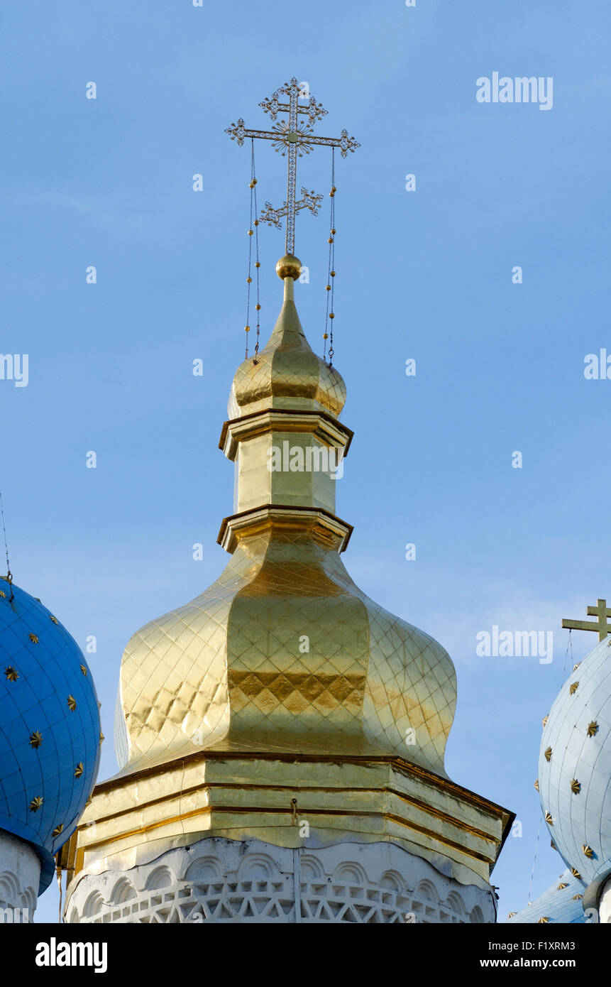 traditional golden onion dome with cross on top of a Russian Annunciation Cathedral inside the Kremlin, Kazan, Tatarstan, Russia Stock Photo