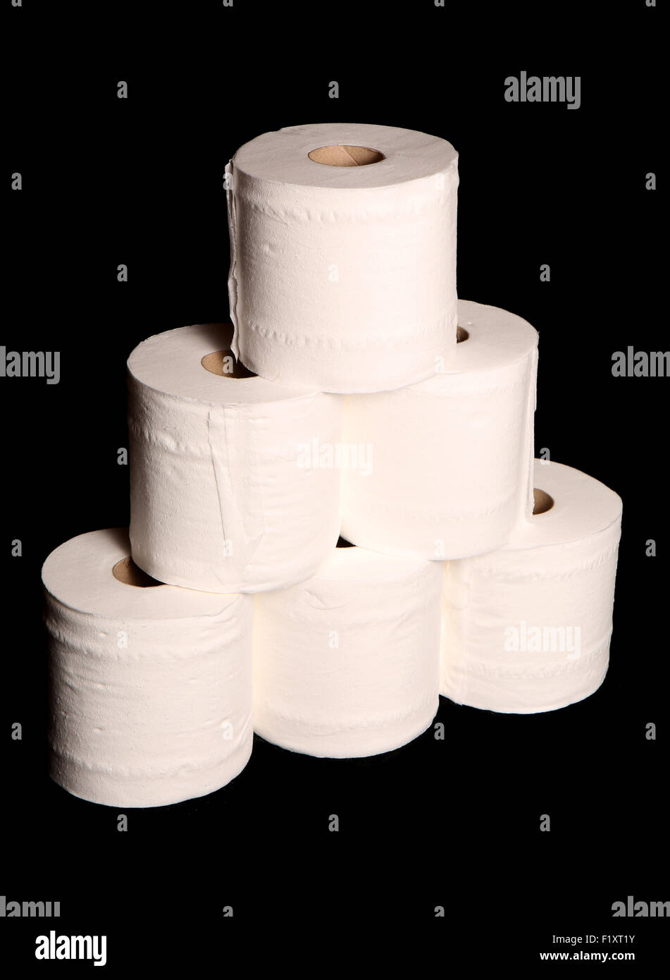 Stack Of Toilet Paper Rolls On Black Background Stock Photo Alamy