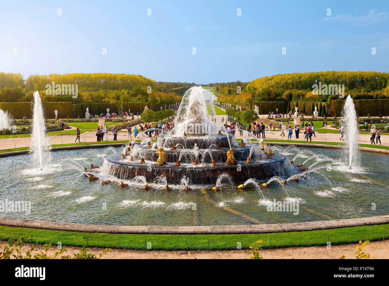 France, Yvelines, Chateau de Versailles, listed as World Heritage by UNESCO, castle park and the floodlit fountain of Latona Stock Photo