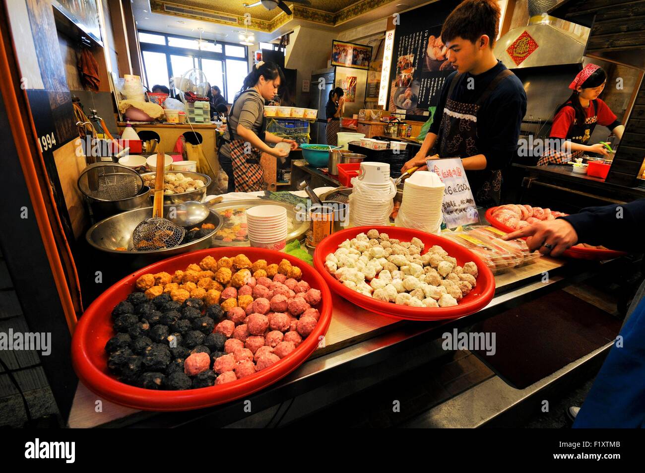 Taiwan, New Taipei City, Ruifang, Jiufen (Chiufen), food shop and restaurant in the main street Stock Photo