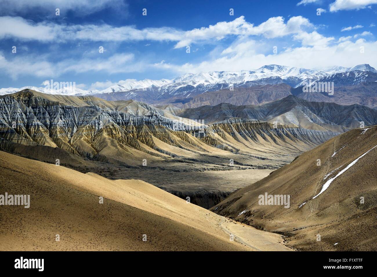 Nepal, Gandaki zone, Upper Mustang (near the border with Tibet), mineral landscape near the village of Ghemi Stock Photo